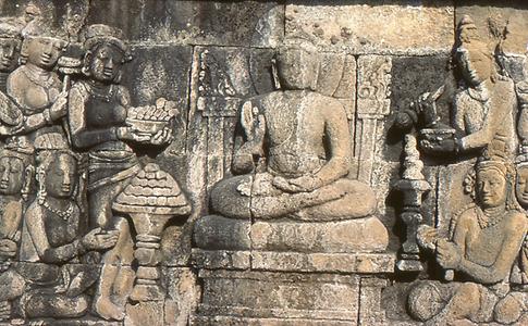 Gesture of fearlessness (skr. Abhayakaramudra) with raised right hand while the other remains in meditation position Gesture of fearlessness (skr. Abhayakaramudra) with raised right hand while the other remains in meditation position