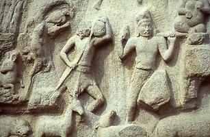 Sculptor working on the figure of a deity Sculptor working on the figure of a deity