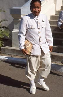 Servants of the Hindu cult in the palace with a seashell as a signal horn Servants of the Hindu cult in the palace with a seashell as a signal horn