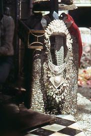 After having been cleaned from blood the image of the goddess is covered with a silver gown. This is done after each sacrifice day After having been cleaned from blood the image of the goddess is covered with a silver gown. This is done after each sacrifice day