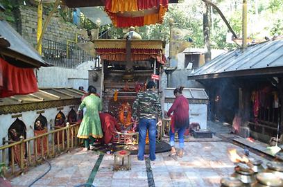 When sacrifices take place only the face of the goddess image is recognized because of many flower garlands. On the left side are niches with other sculptures, which are also involved in the blood sacrifice When sacrifices take place only the face of the goddess image is recognized because of many flower garlands. On the left side are niches with other sculptures, which are also involved in the blood sacrifice