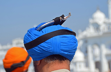 The Kirpan, the required weapon, is not taken off when bathing The Kirpan, the required weapon, is not taken off when bathing