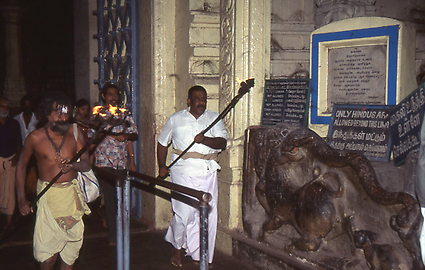 The temple servants leave the shrine, which may not be entered by non-Hindus The temple servants leave the shrine, which may not be entered by non-Hindus