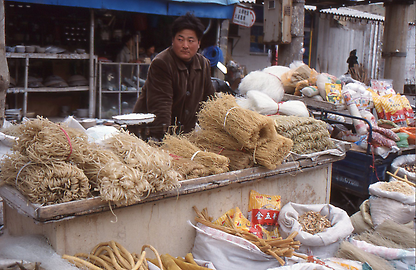 Selling of noodles at a village market Selling of noodles at a village market