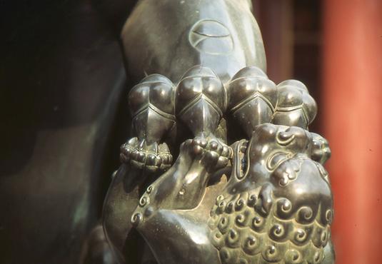 The female maternal counterpart caresses a new-born dragon The female maternal counterpart caresses a new-born dragon