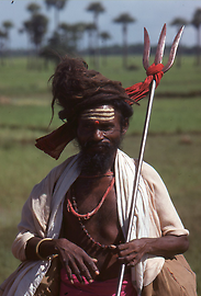 On pilgrimage in southern India. As an attribute he carries the trident of Shiva On pilgrimage in southern India. As an attribute he carries the trident of Shiva