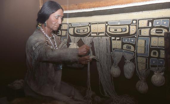 Weaving of a Chilkat blanket on the American Northwest Coast Weaving of a Chilkat blanket on the American Northwest Coast